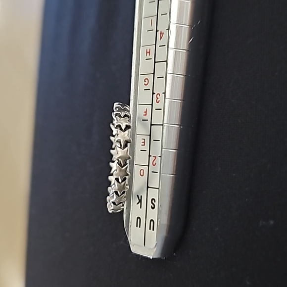 Sterling silver ring with stars all the way around the band. Infinity star band - Picture 2 of 4
